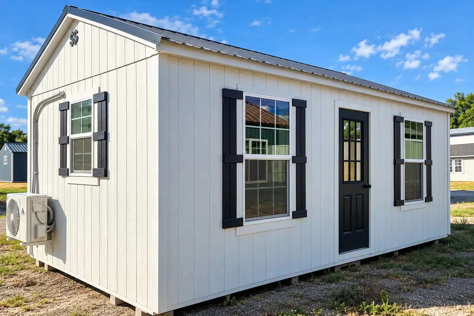Real 12×24 Secure Storage Sheds building equipped with the Comfort Package, showing the nine-lite entry door, 3×5 windows and exterior mini-split unit