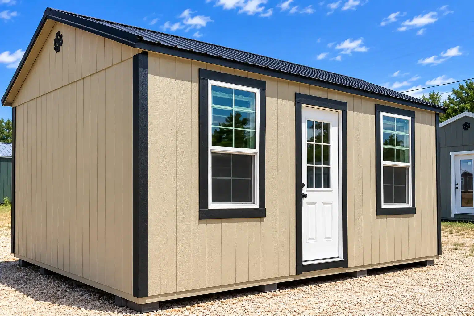 Real Secure Storage Sheds Pro Cottage in tan siding with a black roof, white entry door and two windows