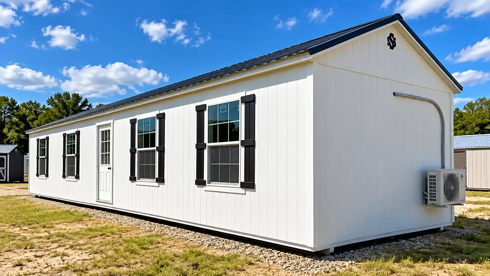 Secure Storage Sheds 16×52 Pro Cottage with Comfort Package, showing windows, entry door and mini-split HVAC condenser