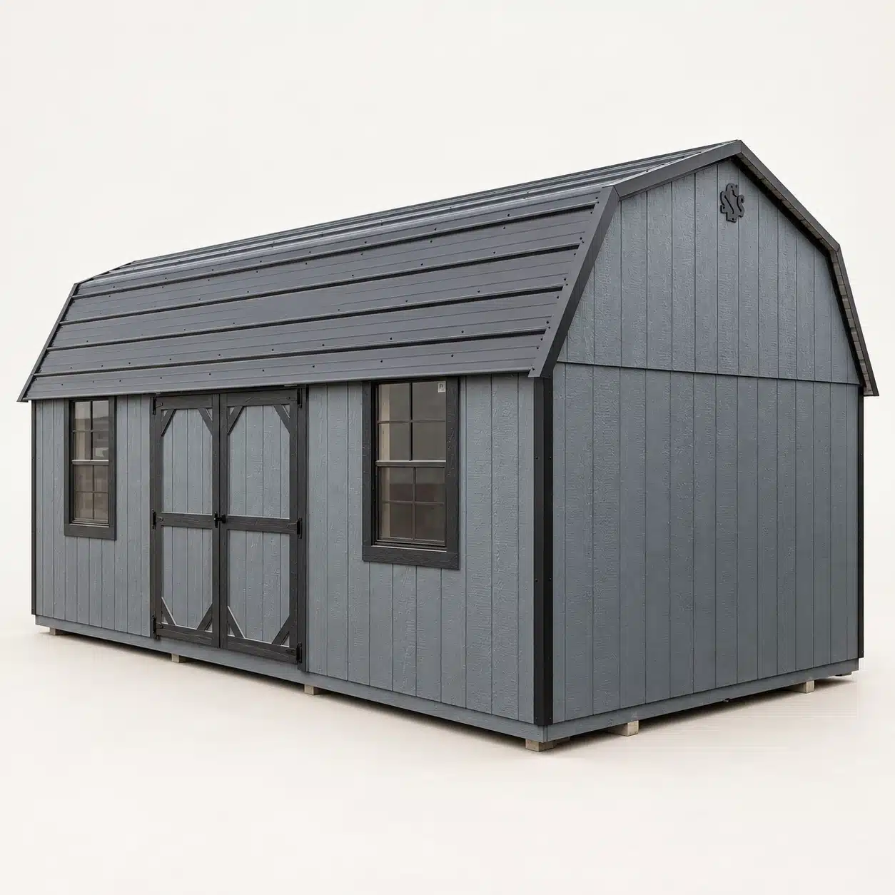 Gray Painted Value Barn with a gambrel metal roof, dark trim, double doors and two windows